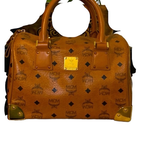 MCM Boston bag beautiful bag inside and out. Reposhing the item & never used it - Picture 10 of 16